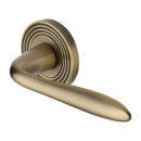 Heritage Brass Sutton Reeded Door Handle on Round Rose