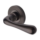 Heritage Brass Charlbury Reeded Door Handle on Round Rose