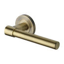 Heritage Brass Phoenix Door Handle on Round Rose