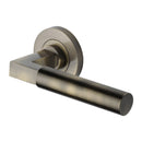 Heritage Brass Spectral Door Handle on Round Rose