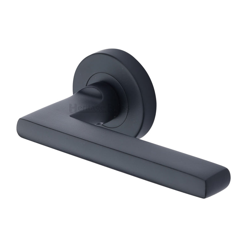 Heritage Brass Trident Door Handle on Round Rose