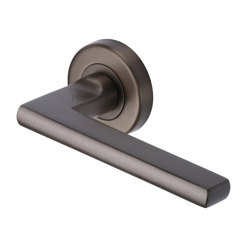 Heritage Brass Trident Door Handle on Round Rose