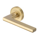 Heritage Brass Trident Door Handle on Round Rose