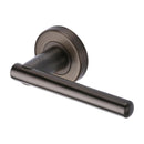 Heritage Brass Challenger Door Handle on Round Rose