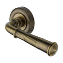 Heritage Brass Colonial Reeded Door Handle on Round Rose
