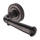Heritage Brass Colonial Reeded Door Handle on Round Rose