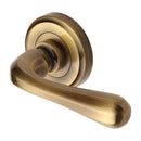 Heritage Brass Charlbury Door Handle on Round Rose