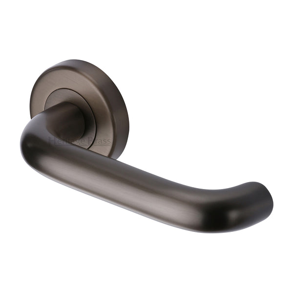 Heritage Brass Harmony Door Handle on Round Rose