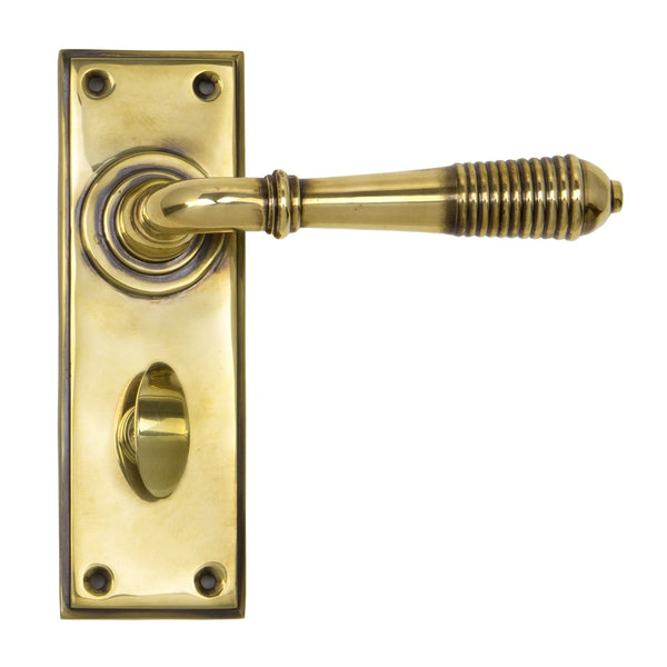 From The Anvil Reeded Bathroom Handles - Aged Brass