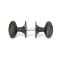 From The Anvil Oval Knob Handles on Round Rose - Beeswax