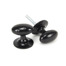 From The Anvil Oval Knob Handles on Round Rose - Black