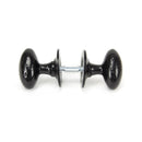 From The Anvil Oval Knob Handles on Round Rose - Black