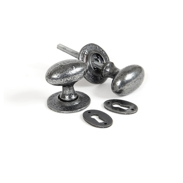 From The Anvil Oval Knob Handles on Round Rose - Pewter