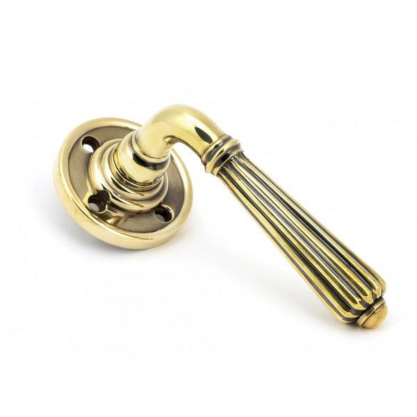 From The Anvil Hinton Lever Handles on Rose - Aged Brass