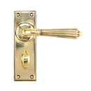 From The Anvil Hinton Bathroom Handles - Aged Brass