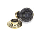From The Anvil Beehive Knob Handles on Round Rose - Ebony & Aged Brass