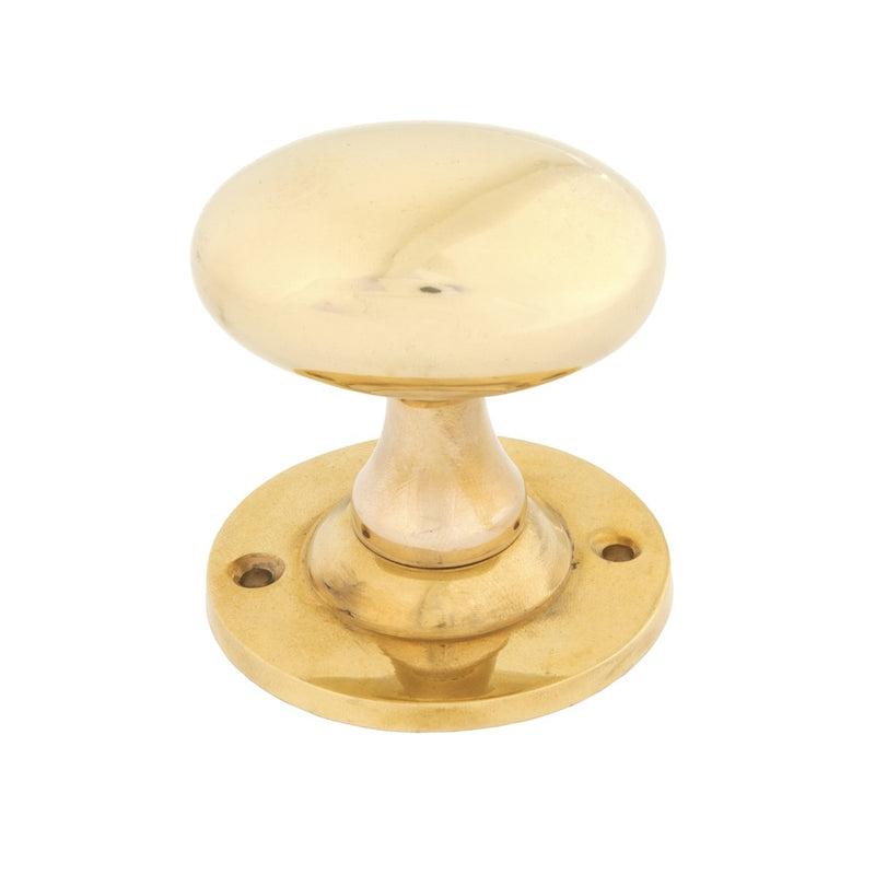From The Anvil Oval Knob Handles on Round Rose - Polished Brass