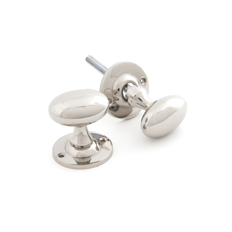 From The Anvil Oval Knob Handles on Round Rose - Polished Nickel