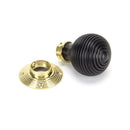 From The Anvil Beehive Knob Handles on Round Rose - Ebony & Polished Brass