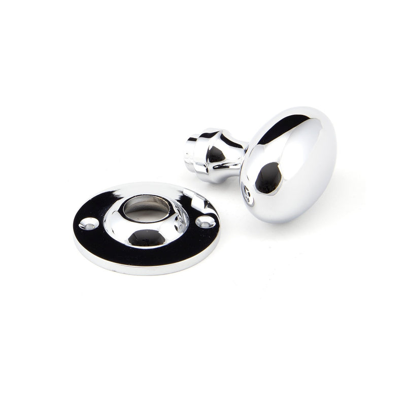 From The Anvil Oval Knob Handles on Round Rose - Polished Chrome
