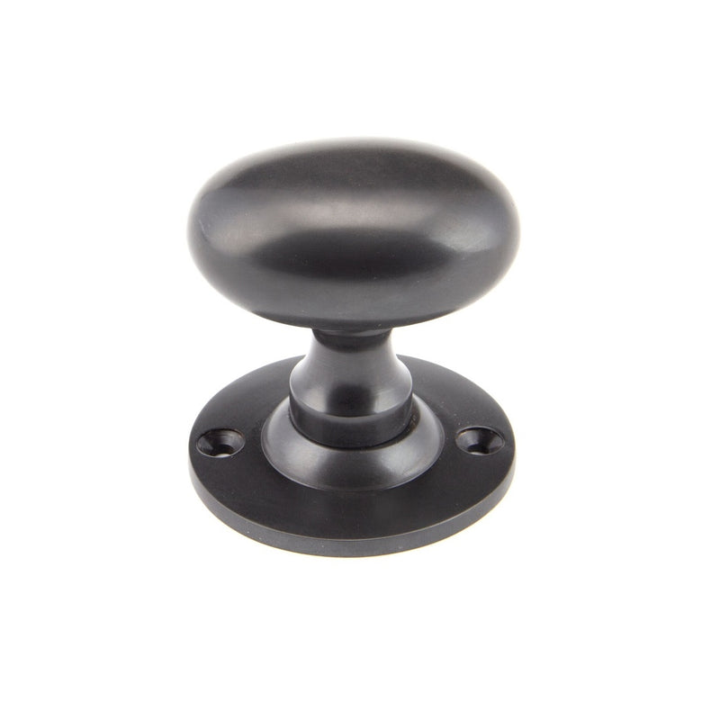 From The Anvil Oval Knob Handles on Round Rose - Aged Bronze