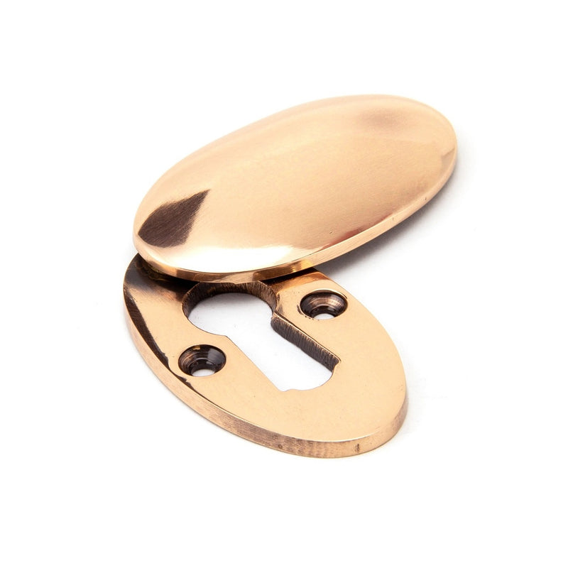 From The Anvil Lever Key Oval Covered Escutcheon - Polished Bronze