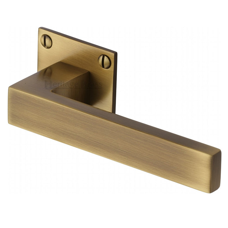 M.Marcus Bauhaus Delta Lever Handles on Square Rose - Antique Brass