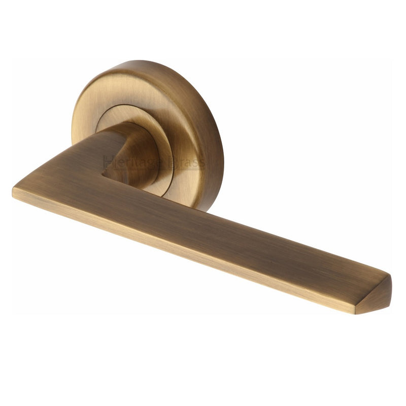 M.Marcus Pyramid Lever Handles on Round Rose - Antique Brass