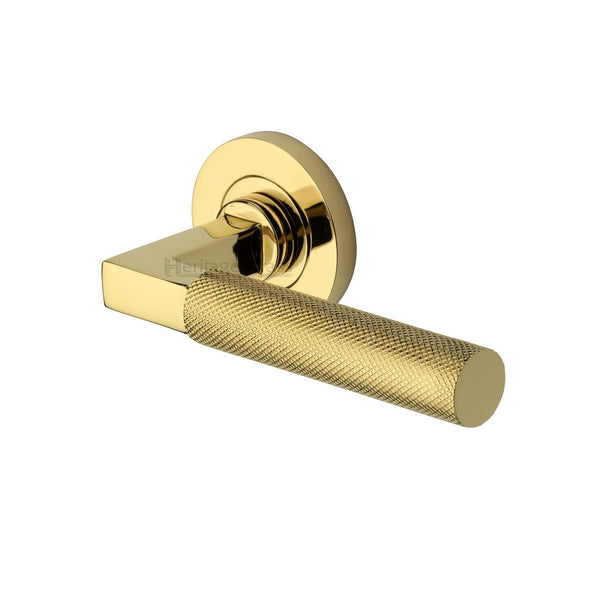M.Marcus Signac Lever Handles on Round Rose - Polished Brass