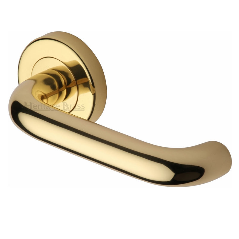 M.Marcus Harmony Lever Handles on Round Rose - Polished Brass