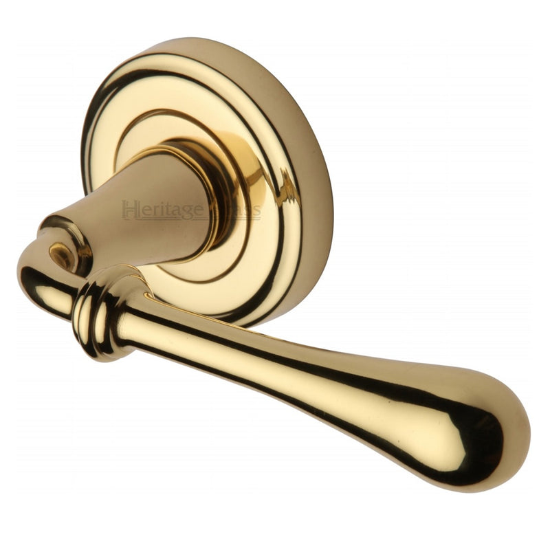 M.Marcus Roma Lever Handles on Round Rose - Polished Brass