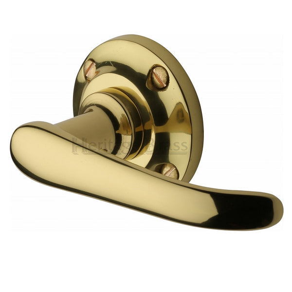 M.Marcus Windsor Lever Handles on Round Rose - Polished Brass