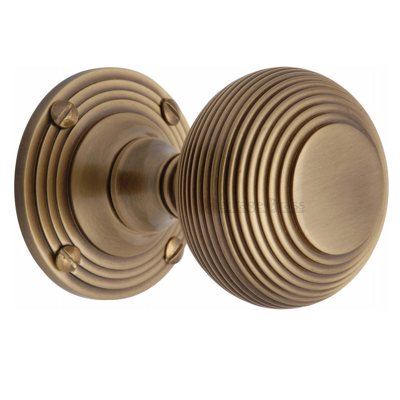 M.Marcus Reeded Mortice Knob Handles on Round Rose - Antique Brass